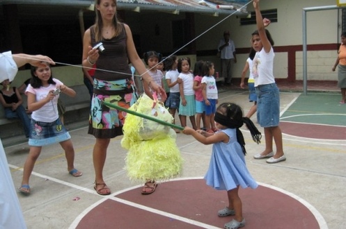 A woman with young girls having fun
